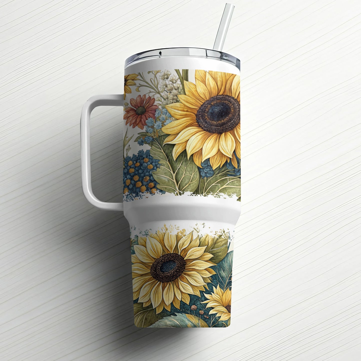 White tumbler with a detailed sunflower and floral watercolor print design.