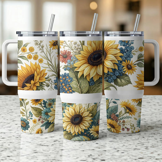 Three tumblers with floral patterns featuring sunflowers, blue flowers, and green leaves.